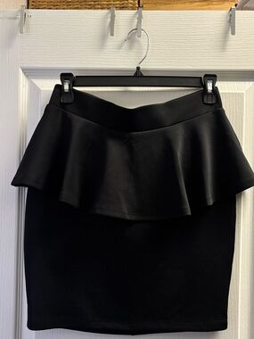 BEBE Black Peplum Pencil Skirt size Medium